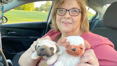 customer with her toy dogs at Culver's